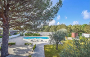 Nice home in Nicolosi with Outdoor swimming pool, WiFi and 2 Bedrooms
